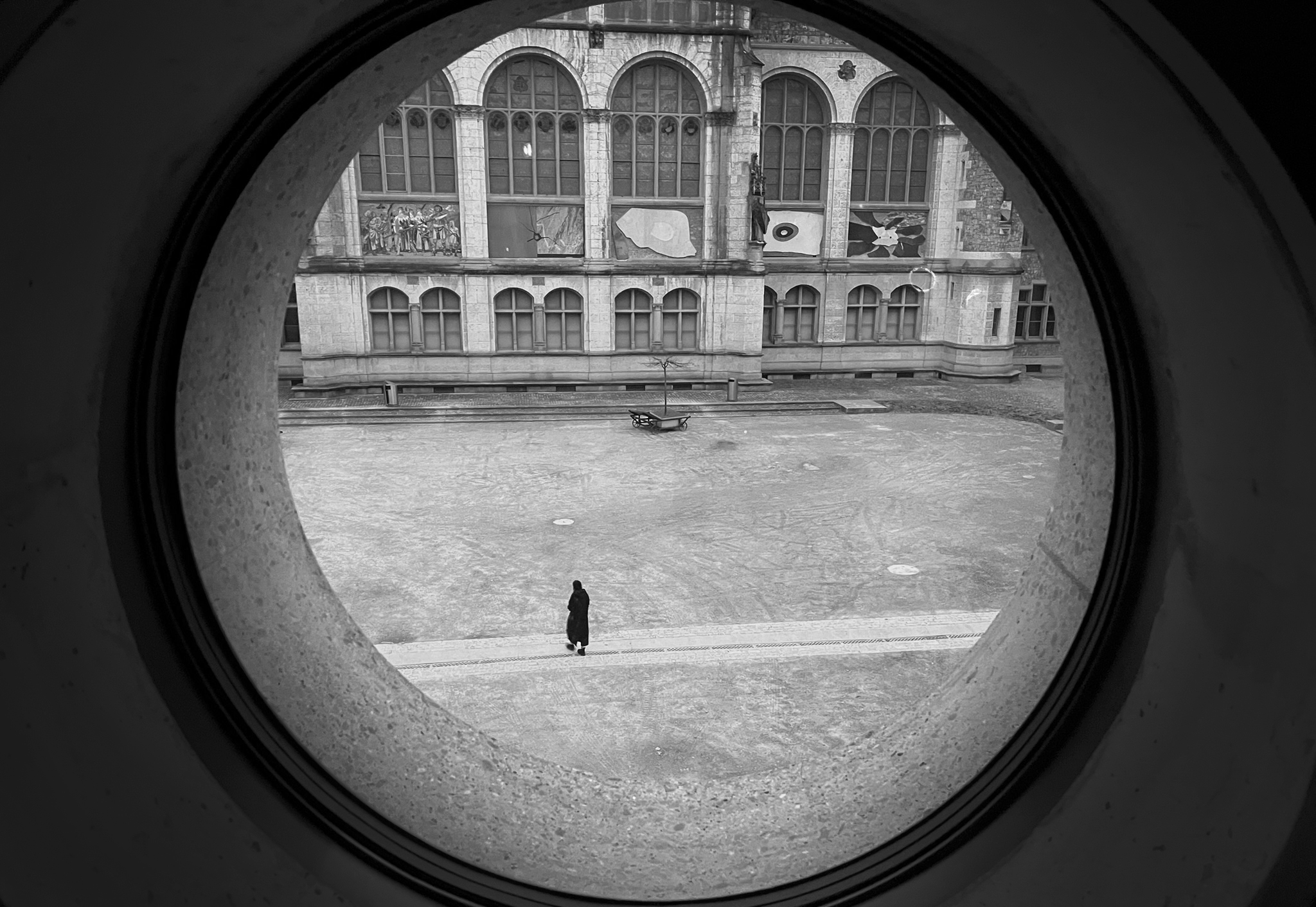 Part of Mark's Street Photography series. On the line, in the circle.